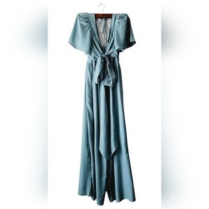 The clothing company long angel sleeves teal color romper size L